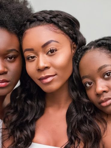 three women with different hairstyles
